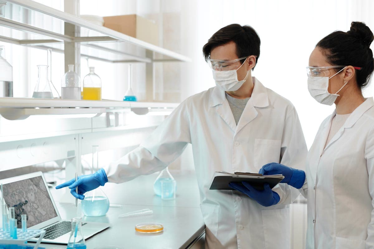Scientists working in advanced research laboratory